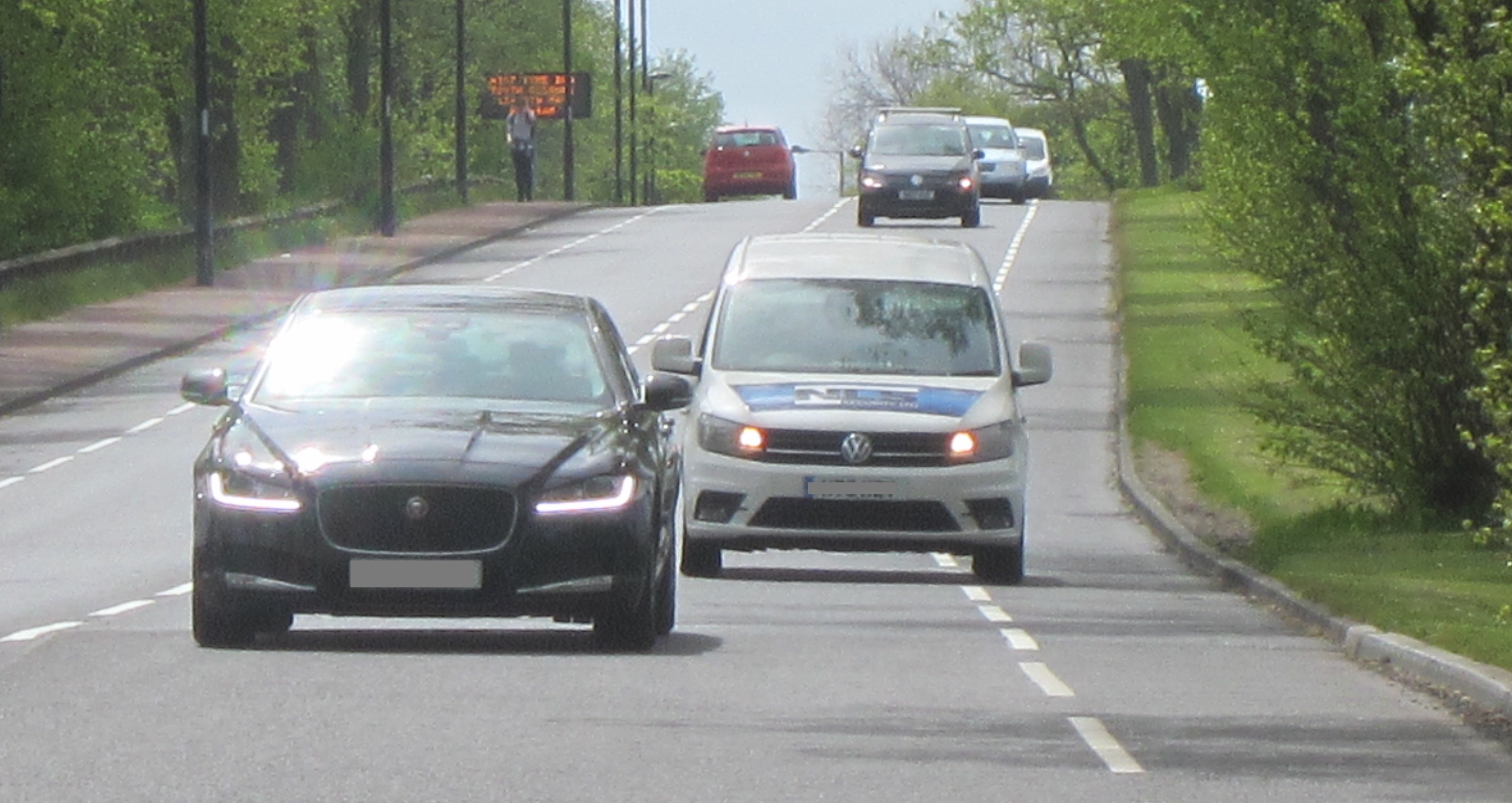 White van driving in the cycle lane on Grandstand Road