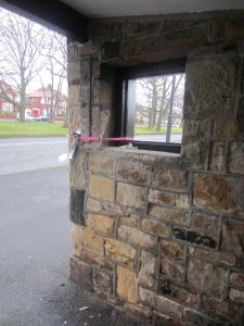 Picture of the inside of a shelter showing no visibility of approaching buses